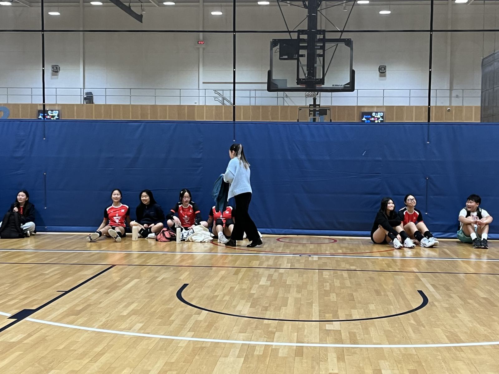 Players taking a break courtside